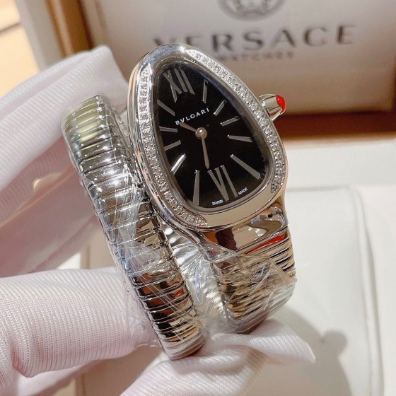 Bulgari Serpentl Collection: Black dial with diamonds and silver snake bezel