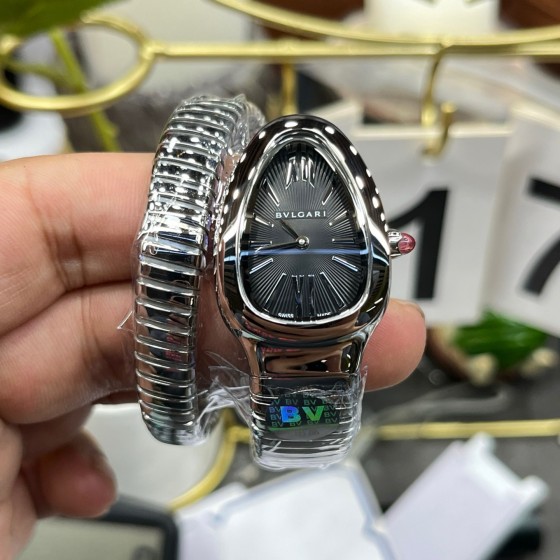 Bulgari Serpenti series, black dial, silver snake bezel