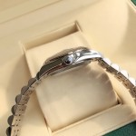 Rolex Datejust, pink dial, silver strap, 31mm.