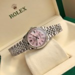 Rolex Datejust, pink dial, silver strap, 31mm.