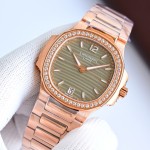Patek Philippe Nautilus – Wave-pattern dial, rose gold bracelet, diamond-set bezel.
