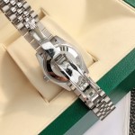 Rolex Datejust, pink dial, silver strap, 31mm.