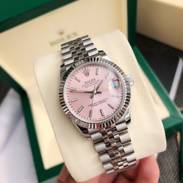 Rolex Datejust, pink dial, silver strap, 31mm.