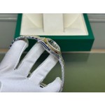 Datejust series, green dial, 31mm, gold and silver two-tone strap.