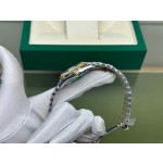 Datejust series, green dial, 31mm, gold and silver two-tone strap.
