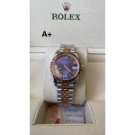 Datejust series, 31mm purple dial, rose gold and silver two-tone strap.