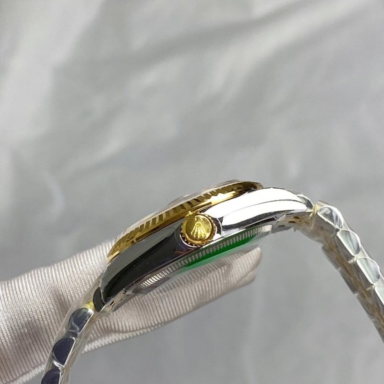 Datejust series, 31mm gold dial with diamonds, two-tone gold and silver strap.