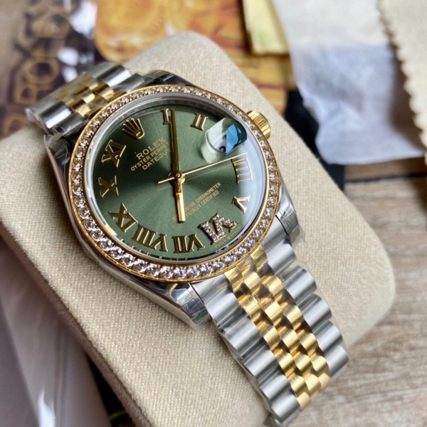 Datejust series, green dial with diamonds, 31mm, gold and silver two-tone strap.