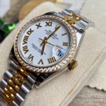 Datejust series, white dial with diamonds, 31mm, two-tone gold and silver strap.