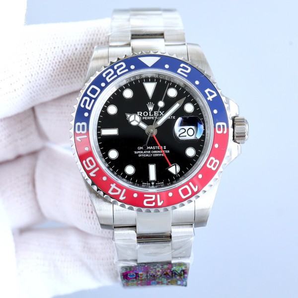 Rolex GMT-Master series, black dial, red and blue bezel, 40mm, silver Oyster bracelet.