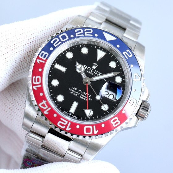 Rolex GMT-Master series, black dial, red and blue bezel, 40mm, silver Oyster bracelet.