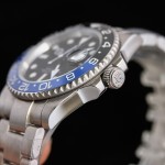 Rolex GMT-Master series, black dial, black and blue bezel, 40mm, silver Oyster bracelet.