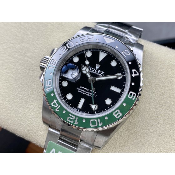 Rolex GMT-Master series, black dial, black and green bezel, 40mm, silver Oyster bracelet.