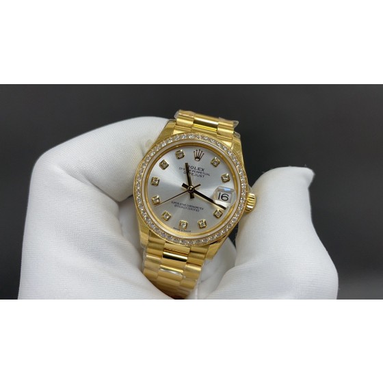 Datejust series, 31mm silver dial with diamonds, gold strap