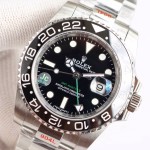 Rolex GMT-Master series, black dial, black bezel, 40mm, silver Oyster bracelet.