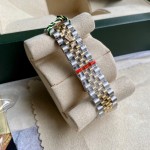 Datejust series, grey dial with diamonds, 31mm, two-tone gold and silver strap.