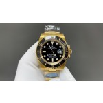 Rolex Submariner with black dial and gold bracelet, 40mm