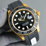 Rolex Yacht-Master series, black dial, black bezel, gold case, 40mm, rubber strap.