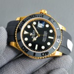 Rolex Yacht-Master series, black dial, black bezel, gold case, 40mm, rubber strap.