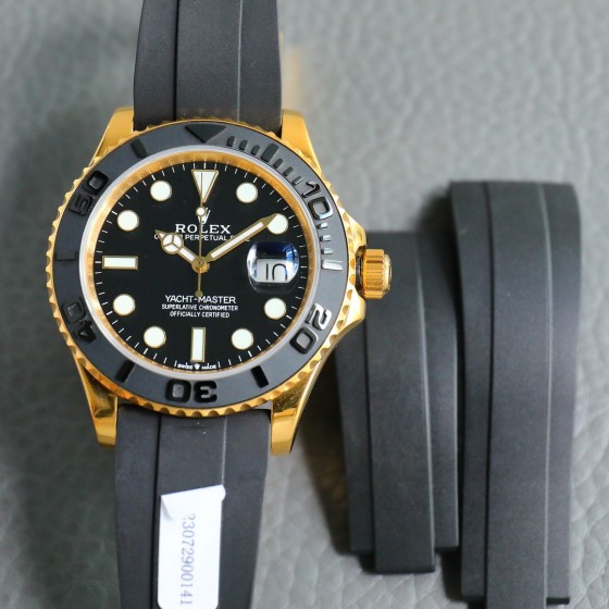 Rolex Yacht-Master series, black dial, black bezel, gold case, 40mm, rubber strap.
