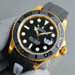 Rolex Yacht-Master series, black dial, black bezel, gold case, 40mm, rubber strap.