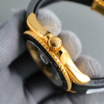 Rolex Yacht-Master series, black dial, black bezel, gold case, 40mm, rubber strap.