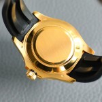 Rolex Yacht-Master series, black dial, black bezel, gold case, 40mm, rubber strap.