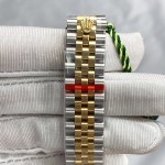 Datejust series, green dial with diamonds, 31mm, gold and silver two-tone strap.