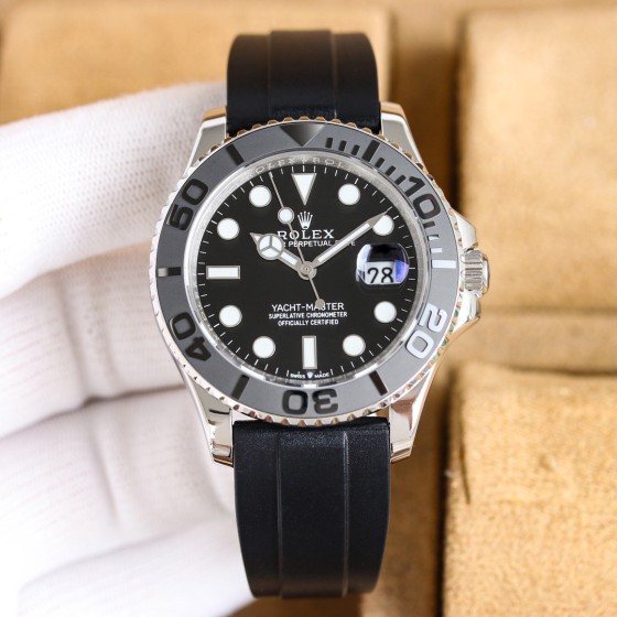 Rolex Yacht-Master series, black dial, gray bezel, silver case, 42mm, rubber strap.