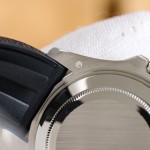 Rolex Yacht-Master series, black dial, gray bezel, silver case, 42mm, rubber strap.