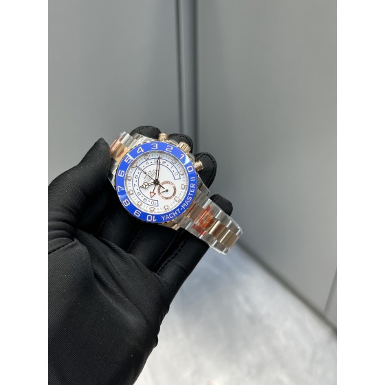 Yacht-Master series watch, white dial, blue bezel, 44mm, gold and silver Oyster bracelet.