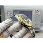 Yacht-Master series, black dial, gold bezel, 40mm, gold and silver bracelet.