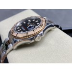 Yacht-Master series, black dial, rose gold bezel, 40mm, two-tone Oyster bracelet.