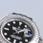 Yacht-Master series, black dial, diamond-set bezel, 40 mm, rubber strap.