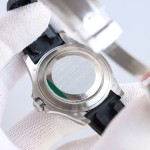 Yacht-Master series, black dial, diamond-set bezel, 40 mm, rubber strap.