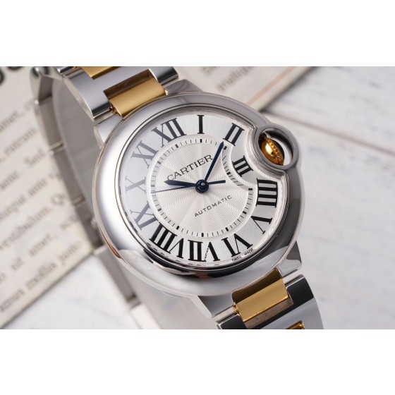 Cartier Ballon Bleu series, 33mm women's watch with silver dial, gold and silver strap, mechanical movement.