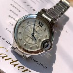 Cartier Ballon Bleu series, 33mm women's watch with silver dial and silver strap, quartz watch.