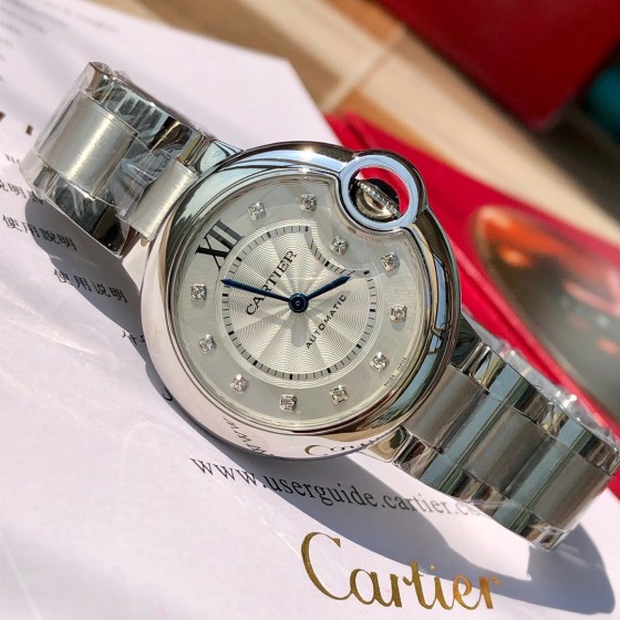 Cartier Ballon Bleu series, 33mm women's watch with silver dial and silver strap, quartz watch.