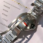 Cartier Ballon Bleu series, 33mm women's watch with silver dial and silver strap, quartz watch.