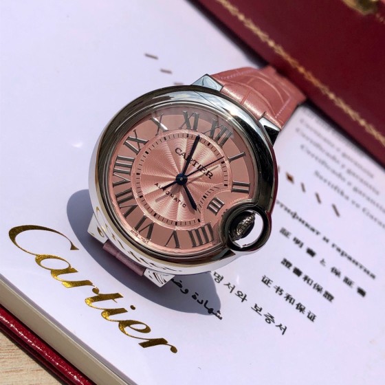 Cartier Ballon Bleu series, 33mm women's watch with pink dial, pink leather strap, mechanical movement.