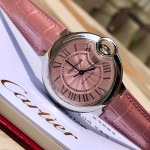 Cartier Ballon Bleu series, 33mm women's watch with pink dial, pink leather strap, mechanical movement.