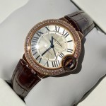 Cartier Ballon Bleu collection, 33mm ladies' watch with silver dial and diamonds, burgundy leather strap, mechanical movement.
