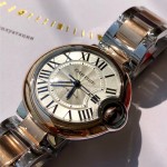 Cartier Ballon Bleu series, 33mm ladies' watch with silver dial and rose gold bezel, two-tone rose gold strap, mechanical movement.