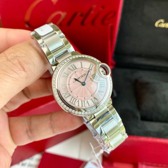 Cartier Ballon Bleu collection, pink dial, diamond-set 33mm women's watch, silver strap, quartz watch.
