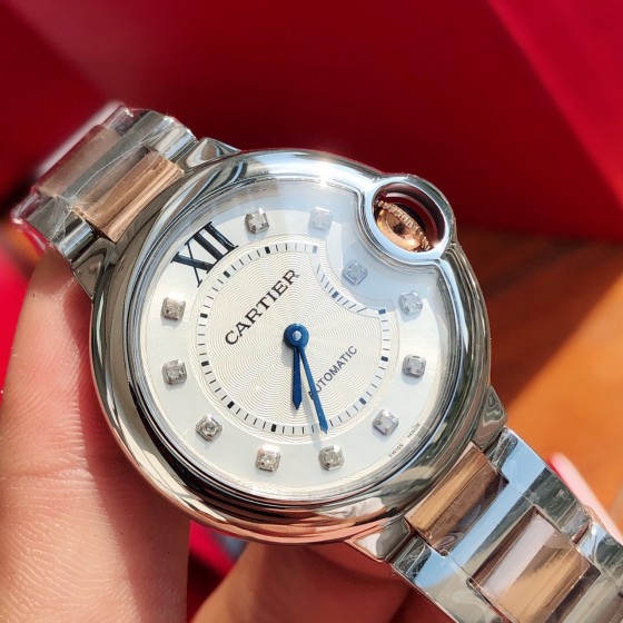 Cartier Ballon Bleu series, 33mm women's watch with silver dial, rose gold two-tone strap, quartz watch.