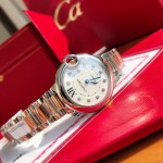 Cartier Ballon Bleu series, 33mm women's watch with silver dial, rose gold two-tone strap, quartz watch.