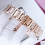 Cartier Ballon Bleu series, 33mm women's watch with silver dial, rose gold strap, quartz watch.