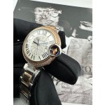 Cartier Ballon Bleu, 33mm, silver dial with diamond-set bezel, two-tone gold and silver.