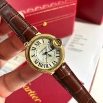 Cartier Ballon Bleu series, 33mm women's watch with silver dial and diamond-set bezel, brown leather strap, mechanical movement.