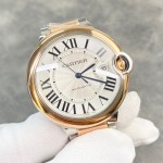 Cartier Ballon Bleu series, 42mm men's watch with silver dial, gold and silver two-tone strap, mechanical movement.
